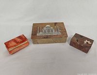Three marble trinket boxes closed