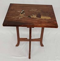 Top view showing full inlaid scene and table shape