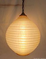 Pendant lit to show glow and ribbing