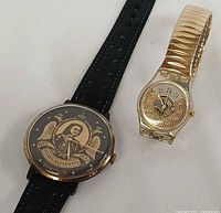 Front view of both wristwatches side by side