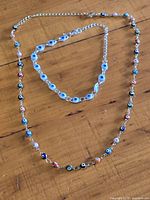 Necklace and bracelet laid flat showing full design and bead pattern