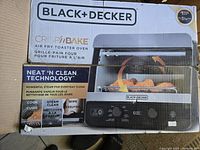 Front of boxed Black+Decker Crisp ‘N Bake air fry toaster oven