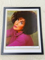 Full view of framed Elizabeth Taylor photograph showing mat and frame