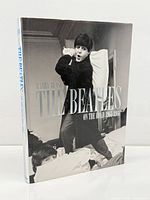 Front view of signed hardcover book with dust jacket