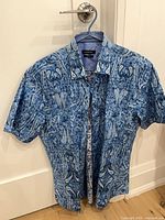 Full front view of Bugatchi paisley shirt on hanger