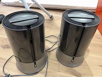 Two Honeywell HUL430 humidifiers with cords on floor