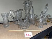 Group shot showing all seven clear cut glass pieces
