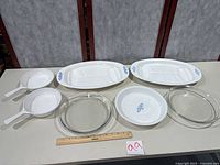 Full set laid out showing all seven pieces with ruler for scale