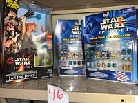 Front view of boxed Jar Jar figure and two blister-card Micro Machines sets
