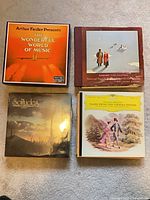 Four LP box and album covers including Arthur Fiedler set, Beethoven Sonats, Solitudes sealed, Johann Strauss Tales from the Vienna Woods