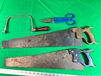 All four tools laid out on green background