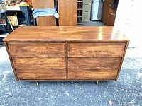 Front view showing six drawers and overall finish