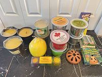 Group shot of all citronella candles, mosquito coils, burners and aerosol