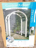 Retail carton image showing assembled Livingston garden arbor and branding