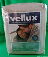 Front of packaged Vellux plush blanket showing branding and image