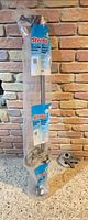 Packaged Strata clothesline elevator standing vertically