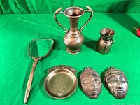 Group view of all six copper and brass items