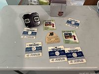 Full lot with viewer, box, reel sleeves, promo cards, instruction card