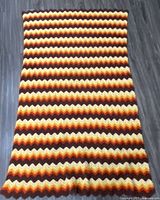 Full view of chevron blanket showing colors and pattern