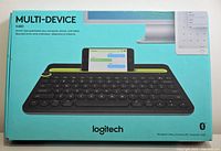 Retail box front showing Logitech K480 keyboard image and device compatibility