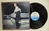 Front sleeve of Nick Gilder City Nights with vinyl record displayed
