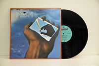 Front sleeve and vinyl record showing label