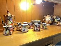 Full set displayed on shelf showing major components