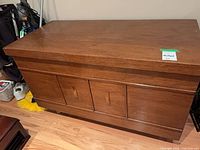 Front and top view of cedar chest showing overall design, casters visible at base