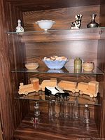 Overview of cabinet shelves showing all items listed