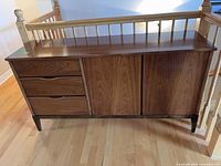 Front perspective showing entire credenza with drawers and cabinet doors