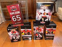 Front view of six boxed Ottawa Senators bobbleheads