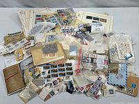 Overview of entire mixed stamp lot