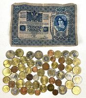 Overall lot with Austrian banknote above rows of mixed coins