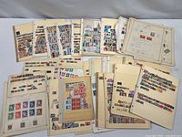 Overview of numerous album pages filled with stamps