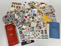 overall lot showing loose stamps, sheets, red booklet and blue stock book