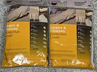 Front view of two sealed Treasure Garden CP119L large chaise protective covers