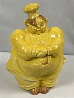 Front view of yellow ceramic Chef Pierre cookie jar