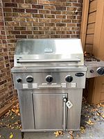 Closed Sonoma stainless steel grill front view