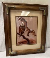 Full view of framed art print showing frame style and matting