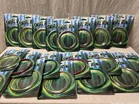 All 18 sealed swirl ring packages displayed