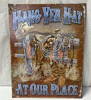 Full view of metal sign showing design and text