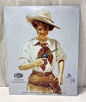 Front view of full sign showing cowgirl artwork and Colt branding
