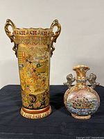 Front view showing both embossed Satsuma vases