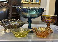 All five carnival glass bowls displayed together