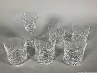 Group of five tumblers and one stemmed goblet