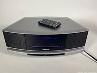 Front view of Bose Wave SoundTouch system with remote on top