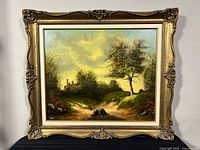 Full view of framed oil painting