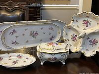 Group shot of all five porcelain pieces