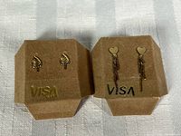 Both earring pairs on felt display cards