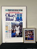 Full view of both framed pieces on table